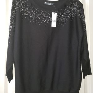 Black dressy sweater top.